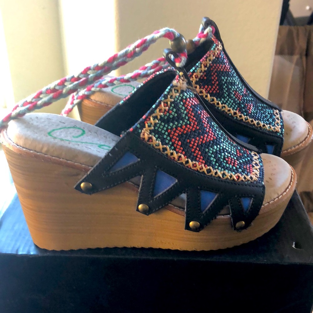 Wedges with ankle ties.